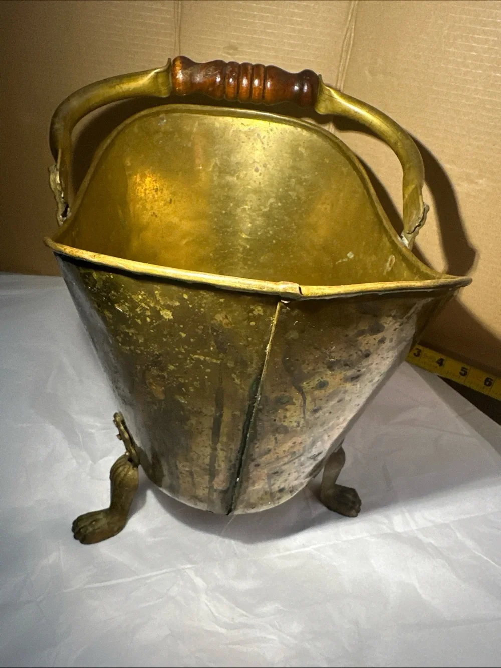 Solid copper and brass coal handle lions head footed made in Ireland 12”x13”x9”